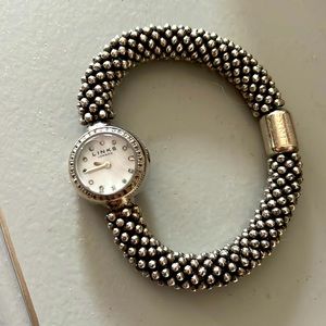 Links of London effervescent watch with mother of pearl face.